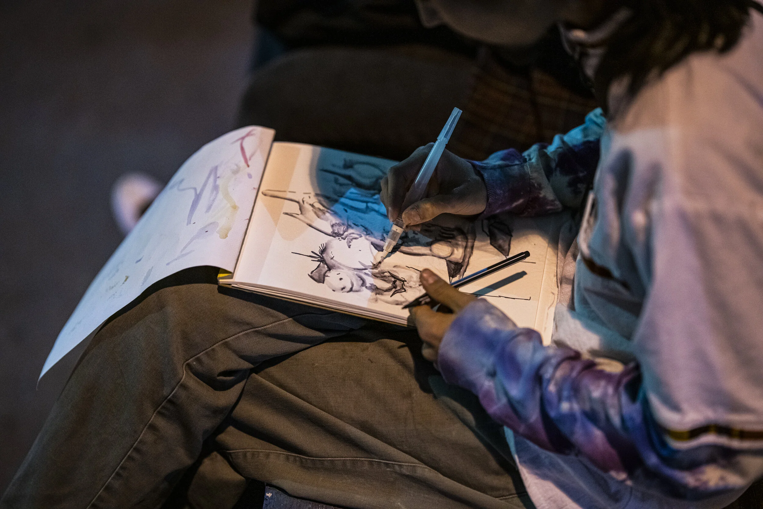 Artist at work during First Friday